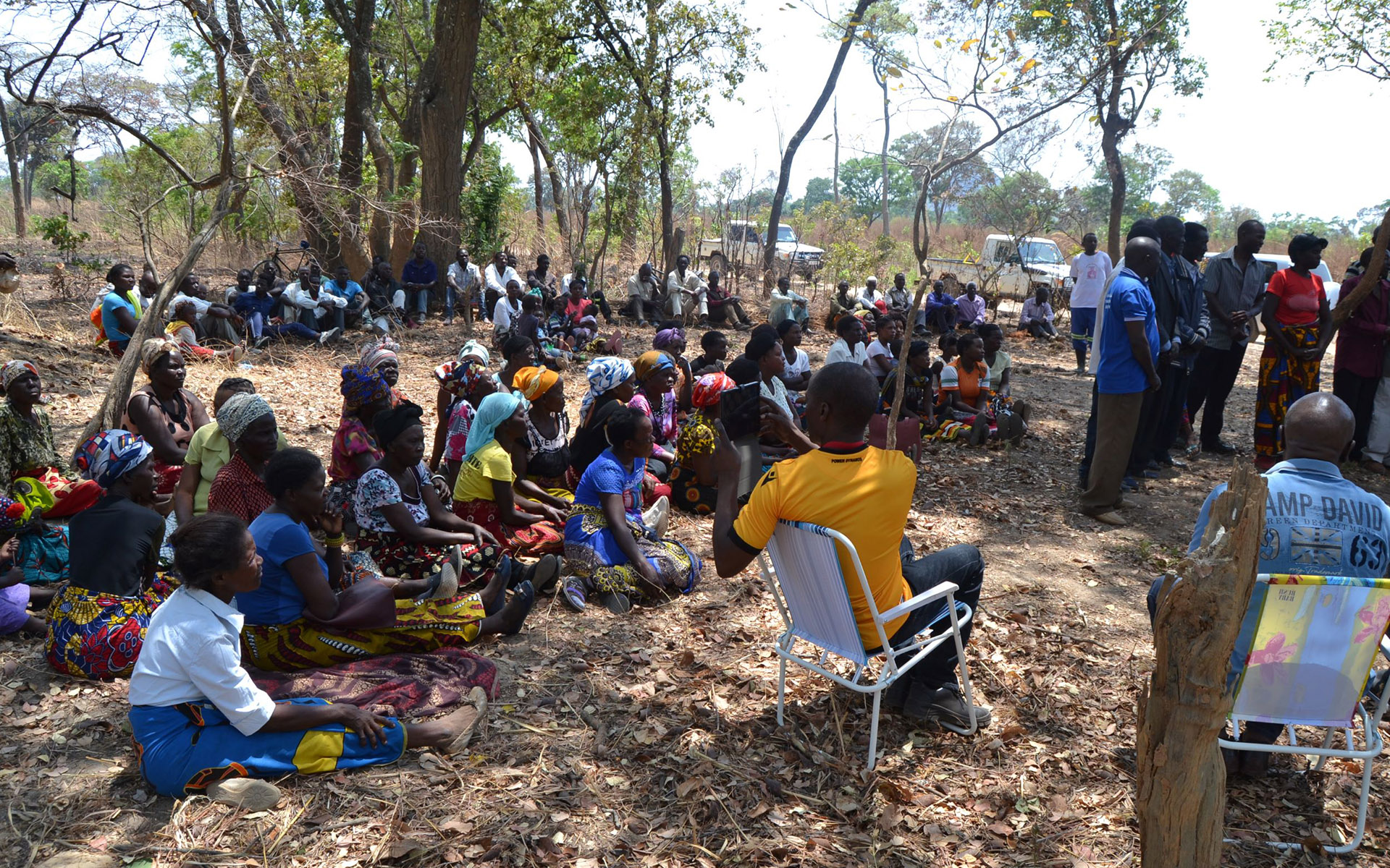 Masaiti villagers convene to discuss the wind farm with Upepo and the Chieftainess.